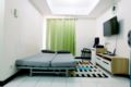 Minimalist 1BR City View The Wave Apt By Travelio ホテル詳細