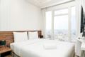 Tranquil 2BR at Menteng Park Apartment By Travelio ホテル詳細