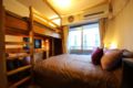 Clean and comfortable room sleeping on loft bed ホテル詳細