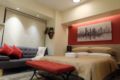 Luxury Suite bedroom in McKinley Hill Taguig ホテル詳細