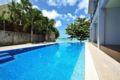 Beachfront Apartment Pool Access - B ホテル詳細